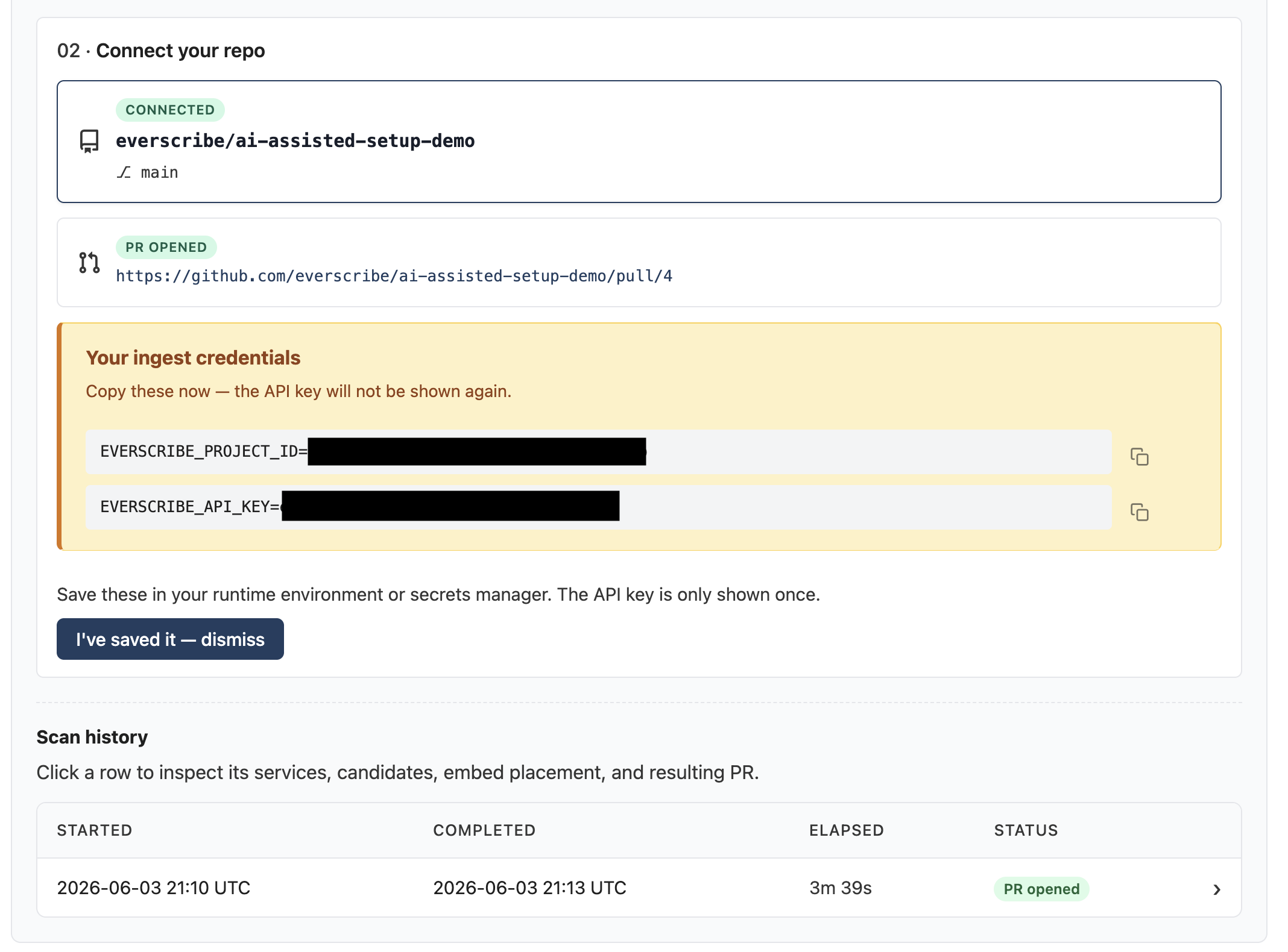 The credentials banner inside the Configuration card: amber alert, two copyable env-var lines, an "I've saved it. Dismiss" button.